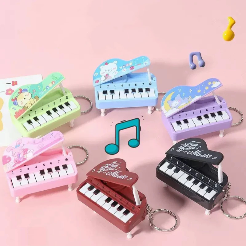 Audio Music Maker - Uroczy breloczek w kształcie mini fortepianu,